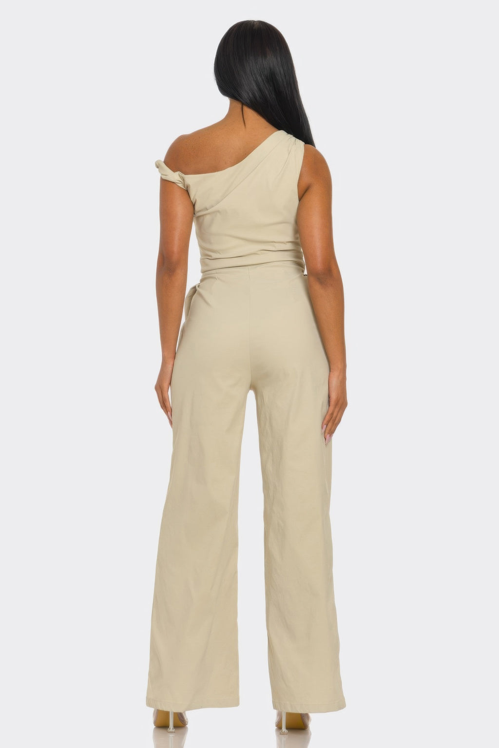 Stone one-shoulder jumpsuit, open back with draped strap and wide legs