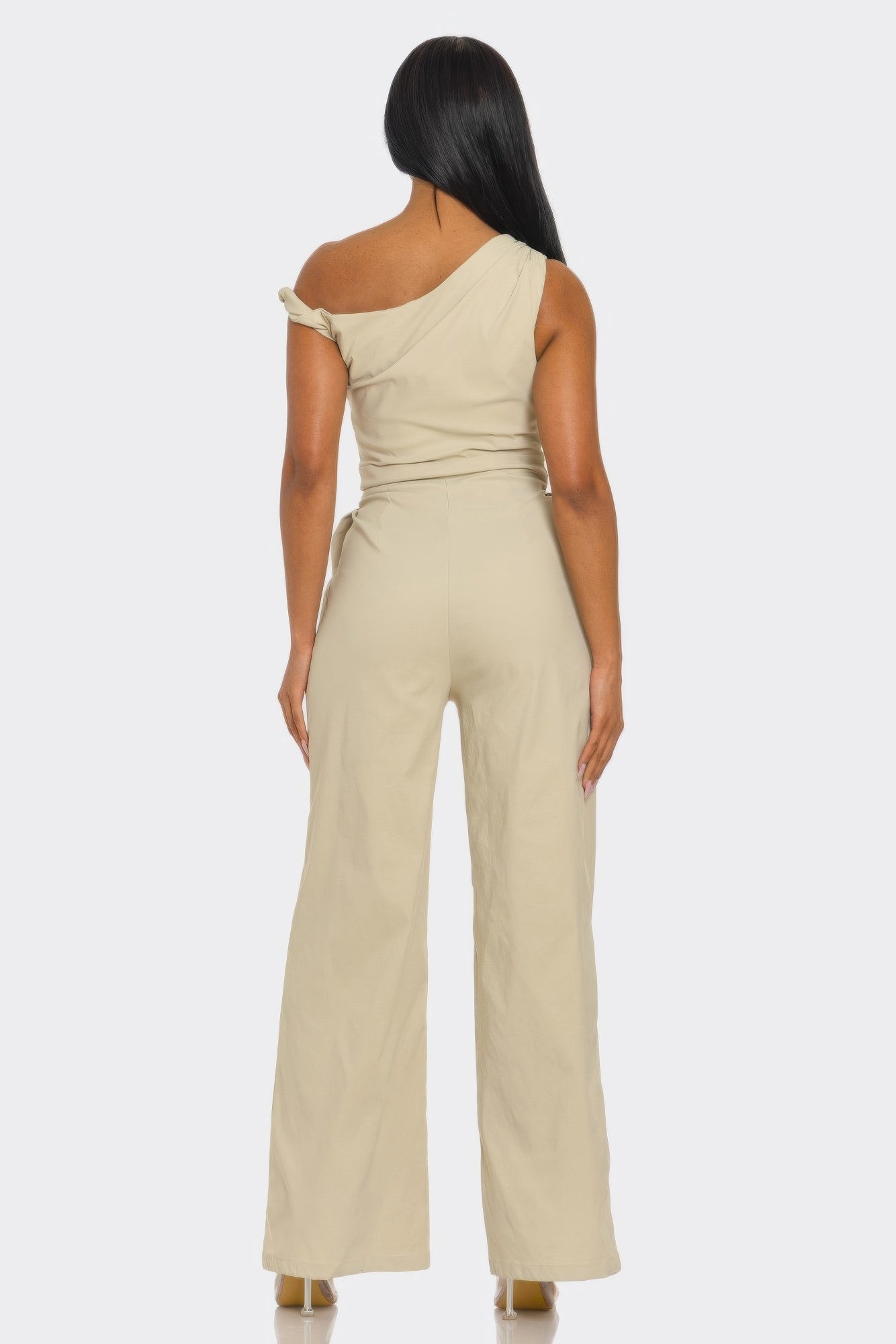 Stone one-shoulder jumpsuit, open back with draped strap and wide legs