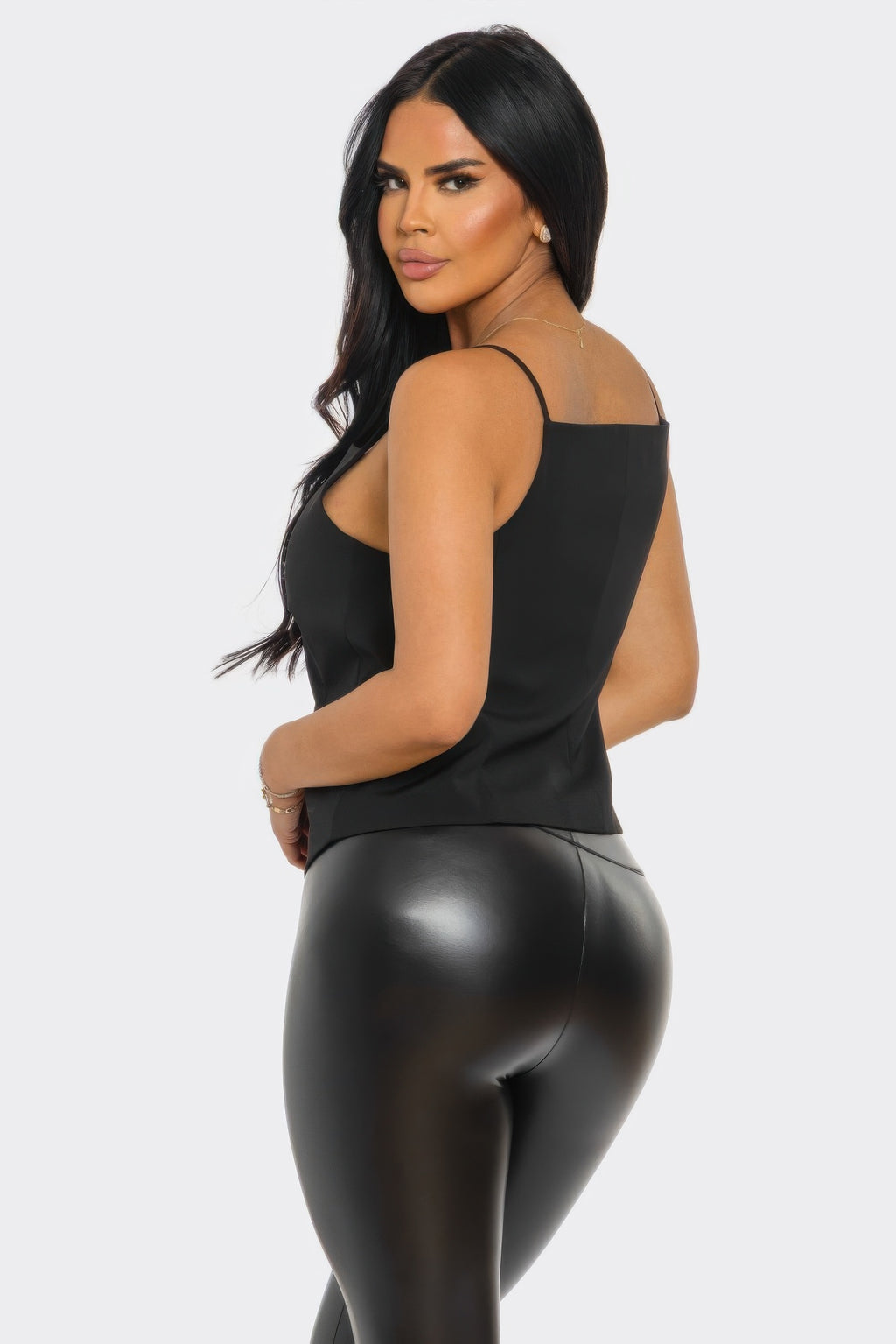 Black button-up corset top from side with spaghetti straps and structured waist