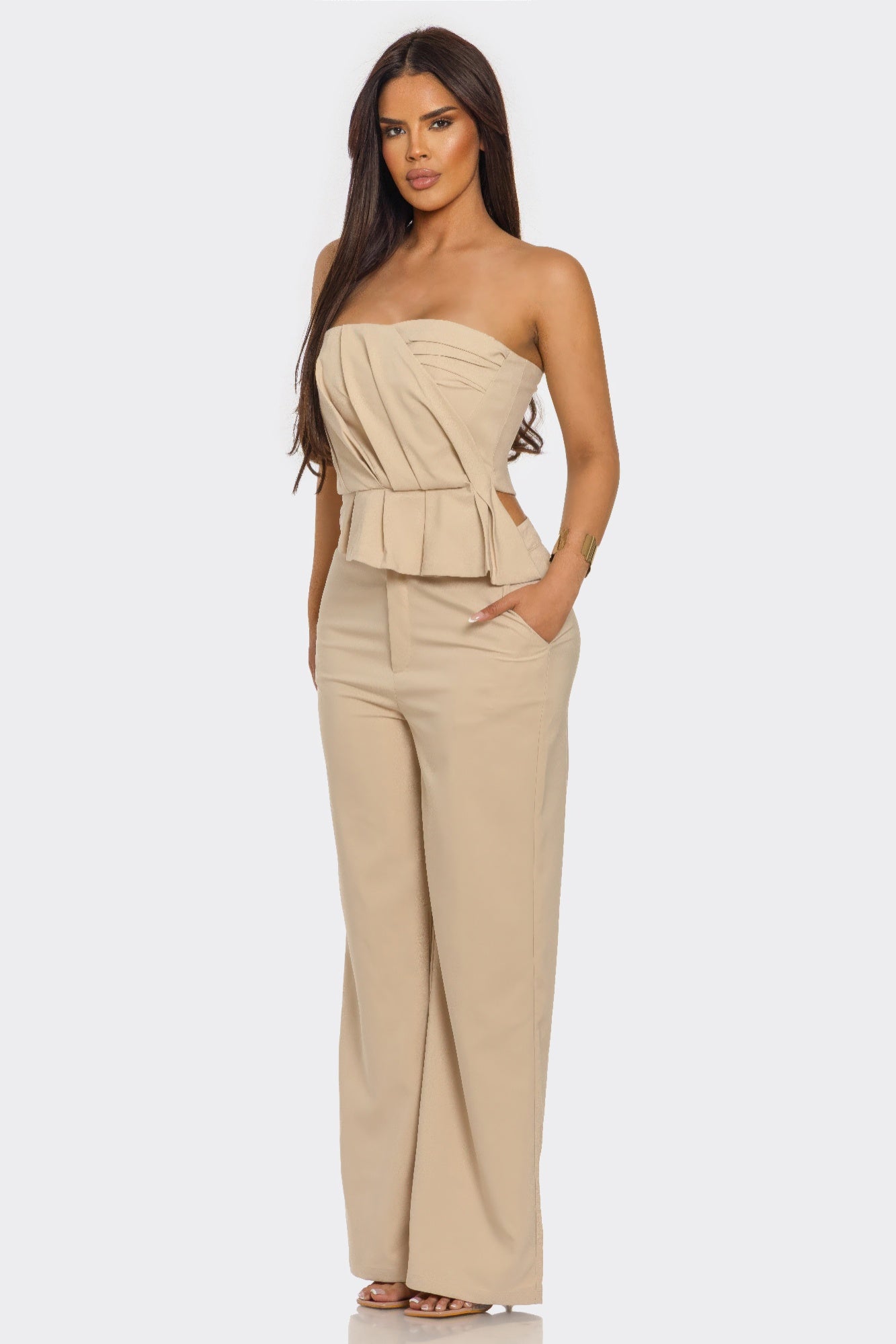 Taupe two-piece set, side view: strapless peplum top and wide-leg pants