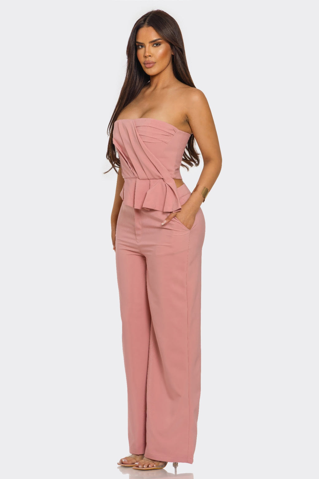 Mauve two-piece set, side view: strapless peplum top and wide-leg pants