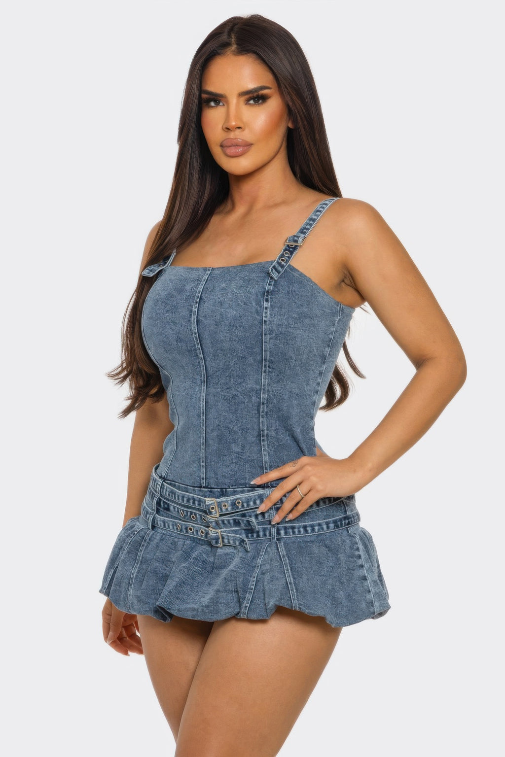 Belted denim mini romper dress with corset-style seams and belted ruffle shorts, side view