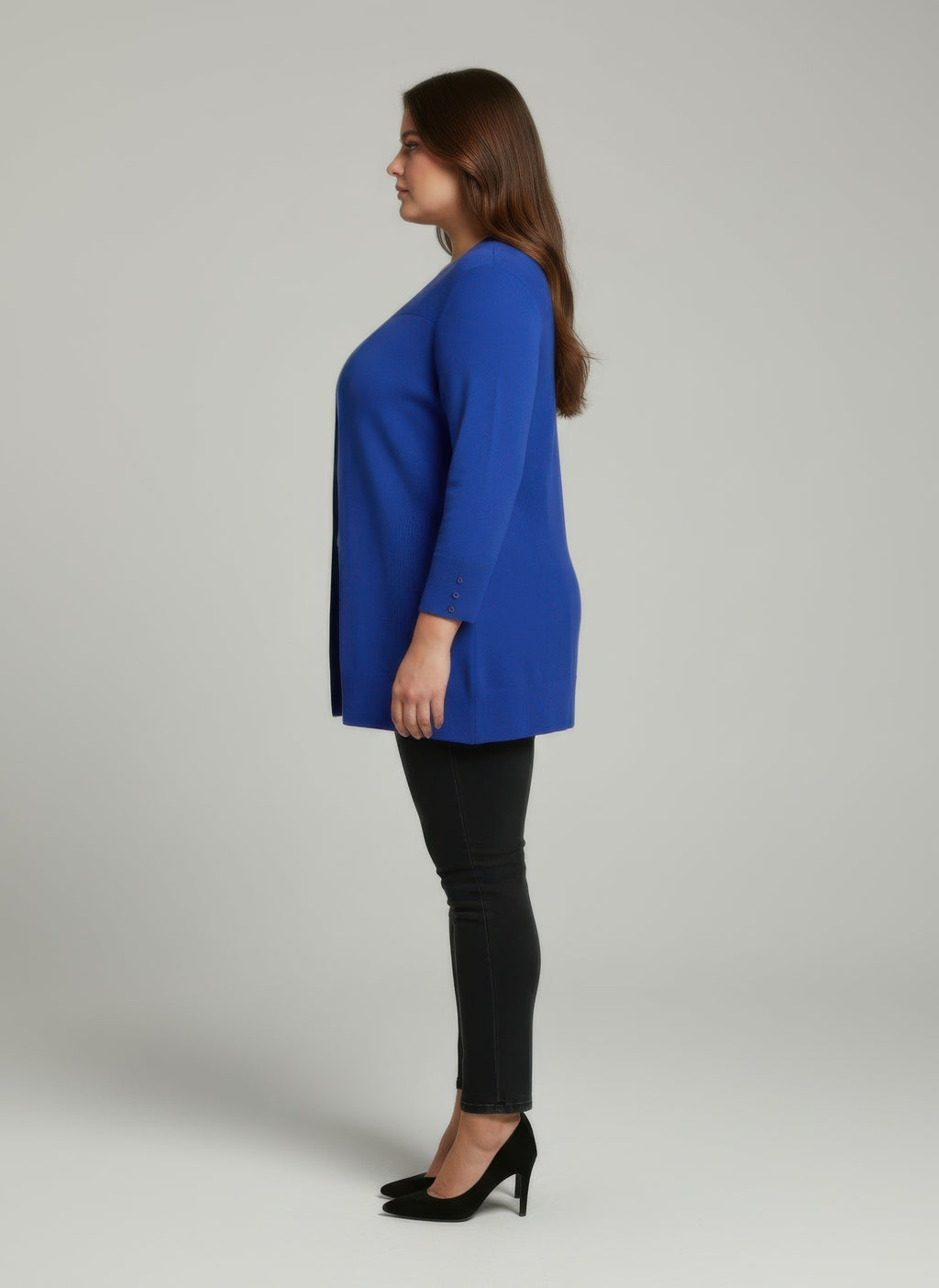 Ribbed knit tunic top, royal blue; side view with button cuff detail