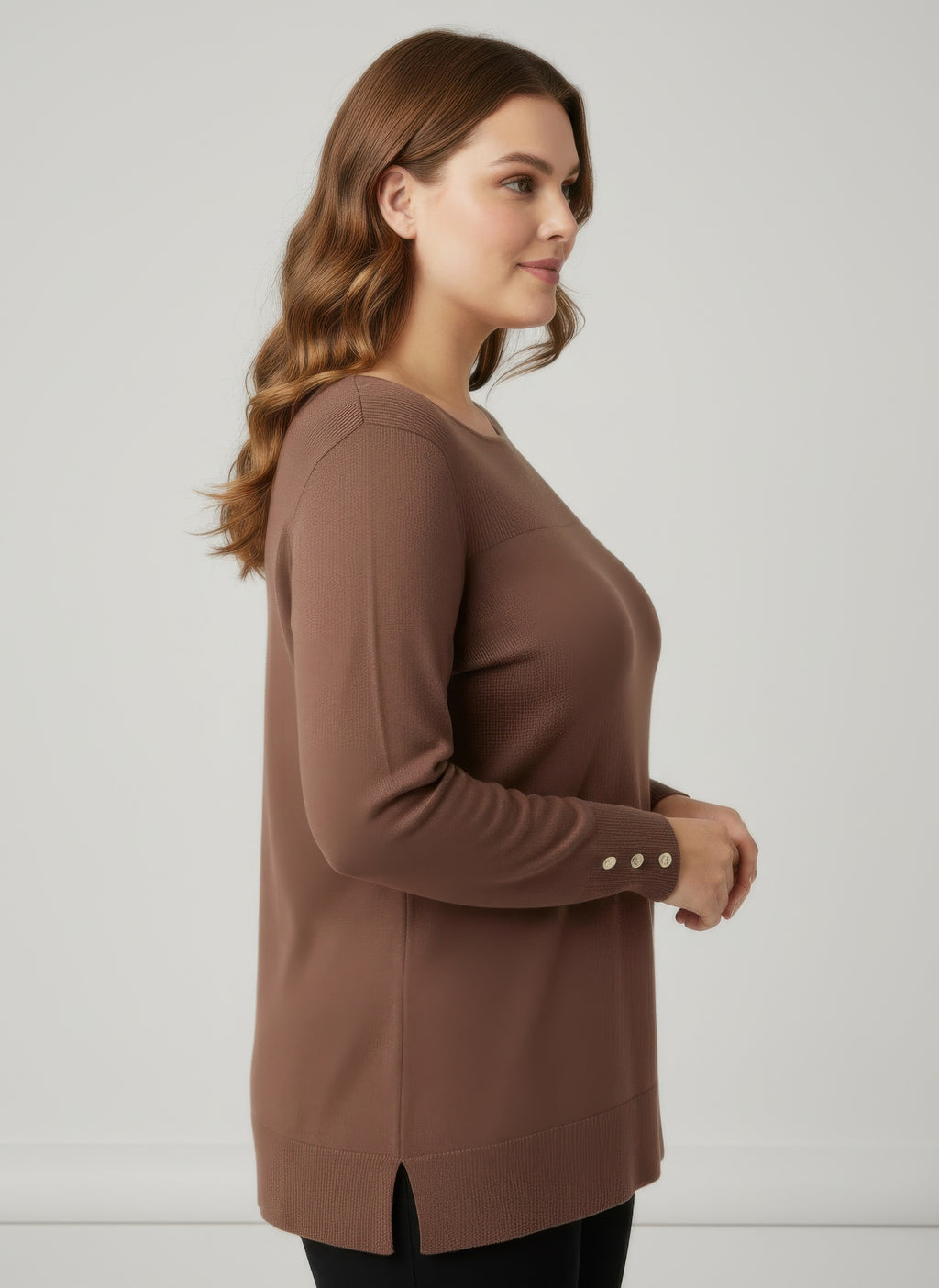 Ribbed knit tunic top, mocha brown; side view with cuff buttons and curved hem
