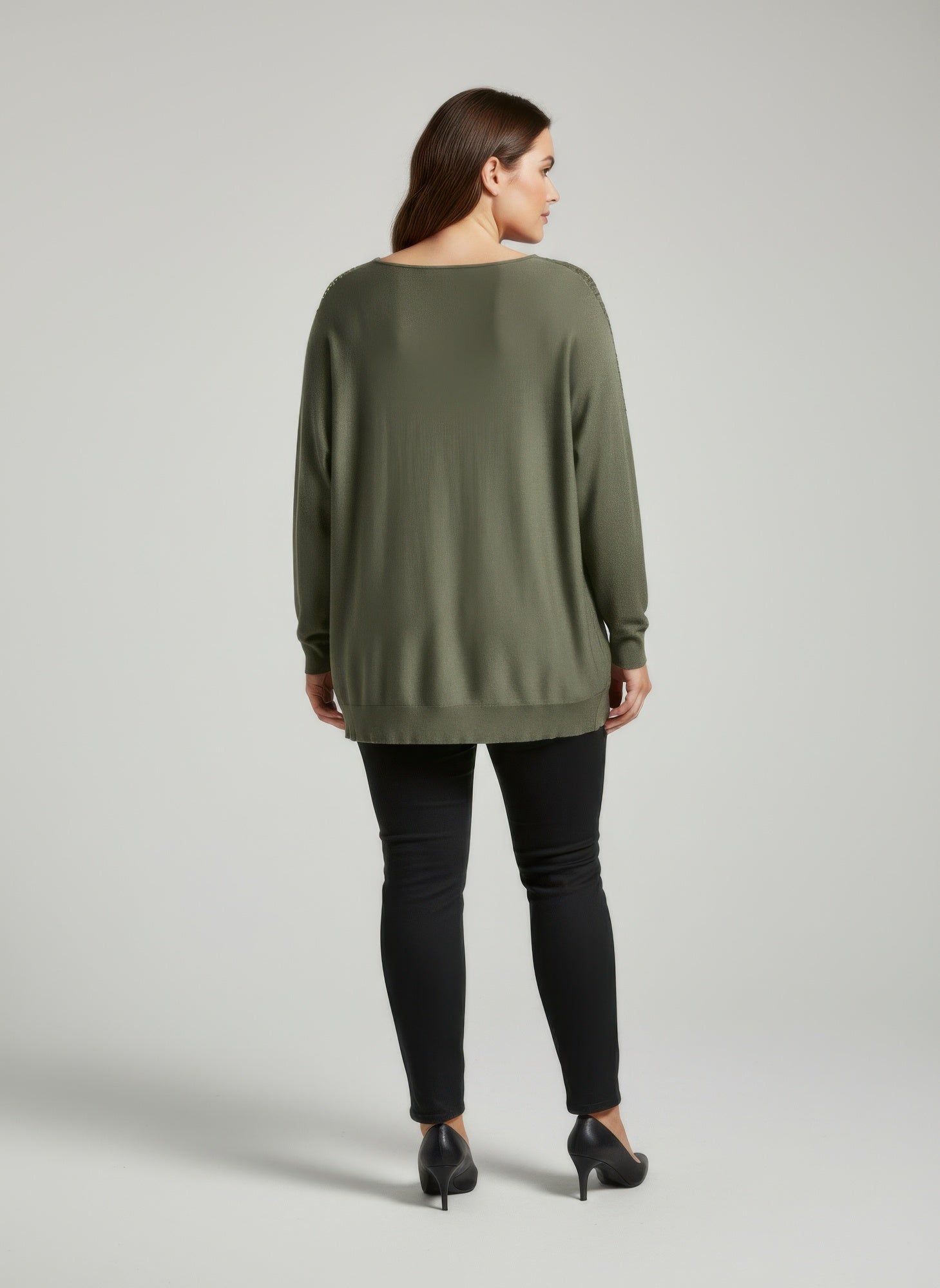 Green sequin shoulder knit tunic top, back view with relaxed long fit