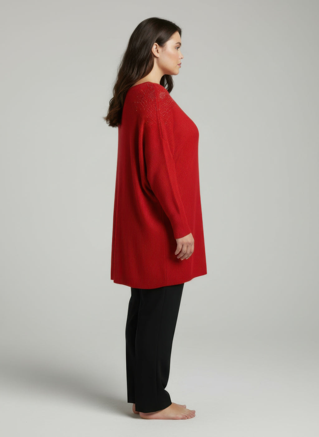Red dolman sleeve tunic top, side view, embellished neckline