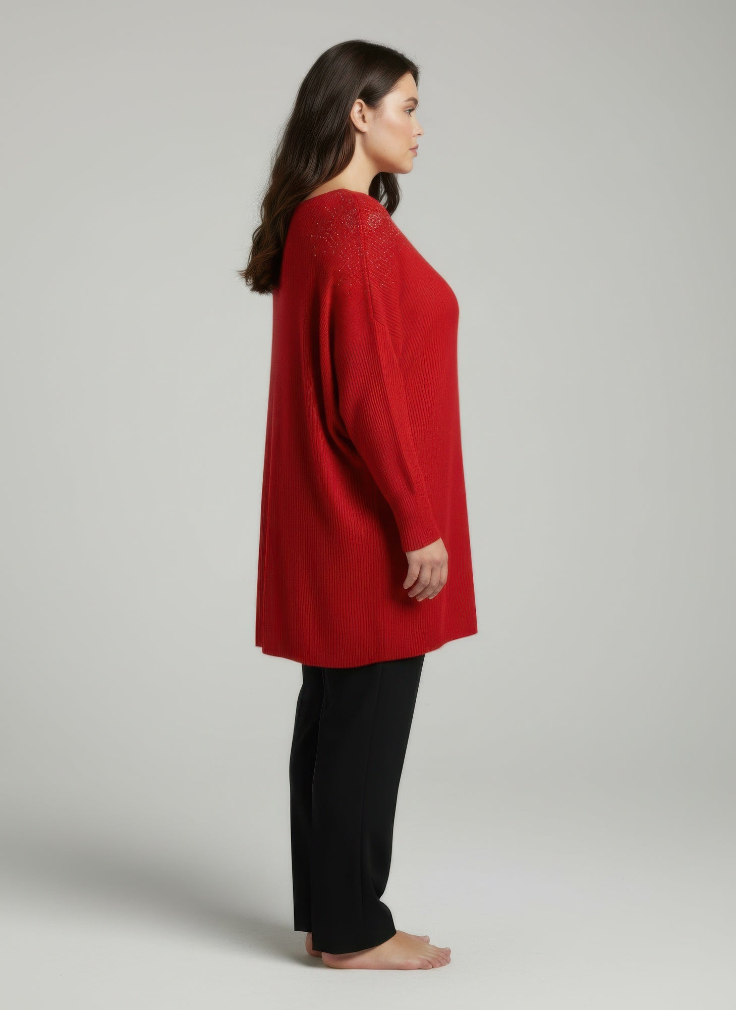 Red dolman sleeve tunic top, side view, embellished neckline