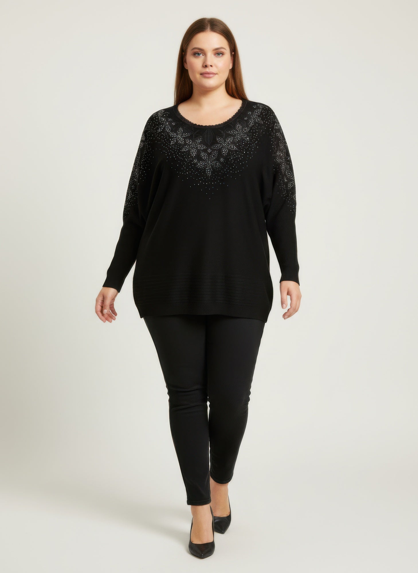 Black embellished knit tunic top with sparkly neckline and long sleeves
