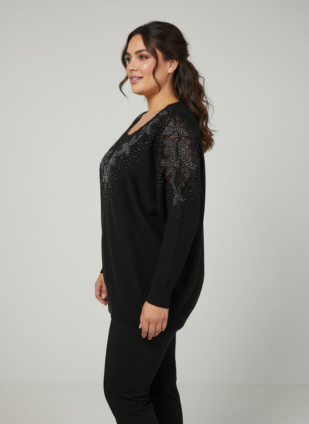 Black embellished knit tunic top, sparkly shoulders and relaxed long sleeves