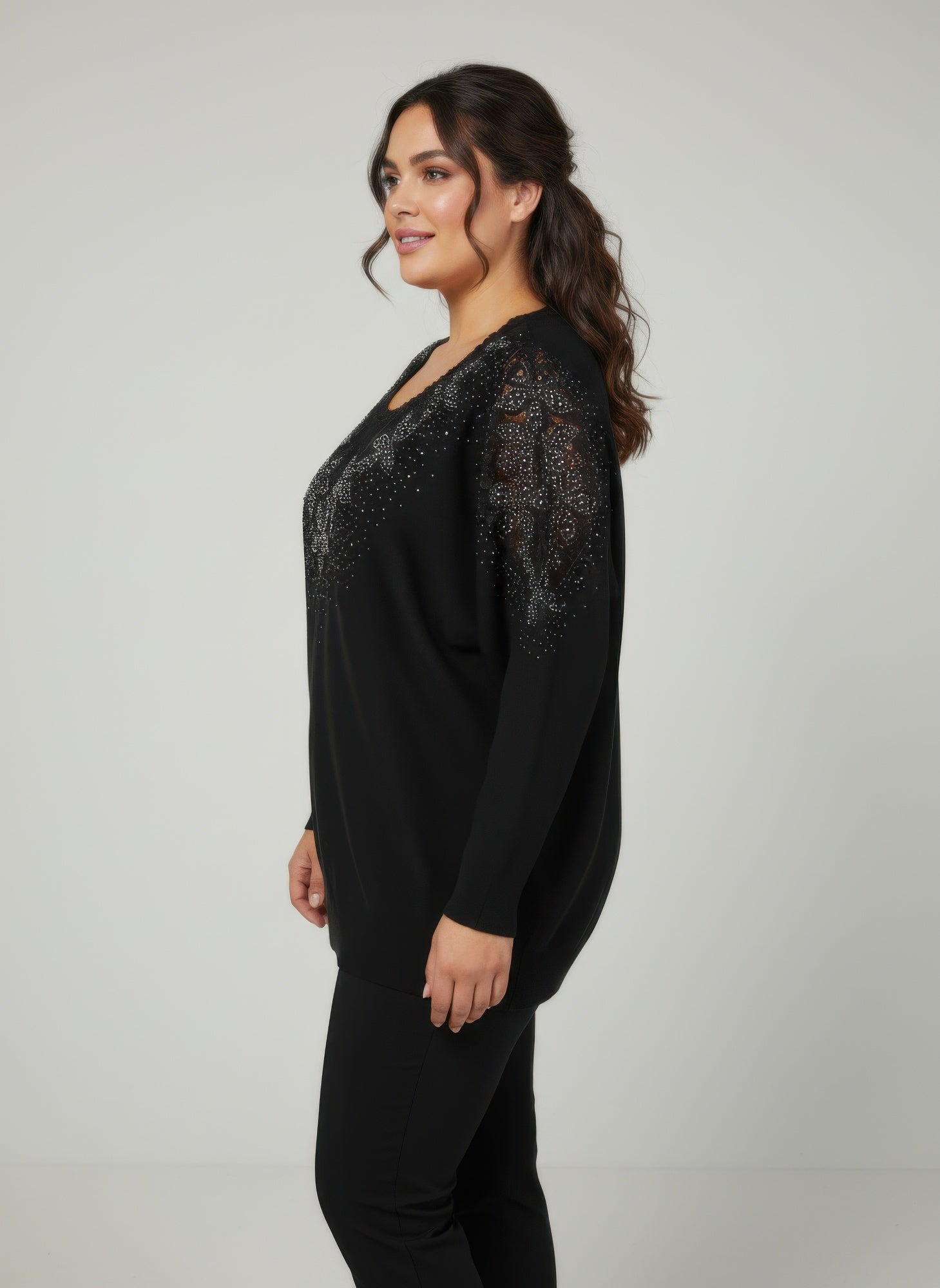 Black embellished knit tunic top, sparkly shoulders and relaxed long sleeves