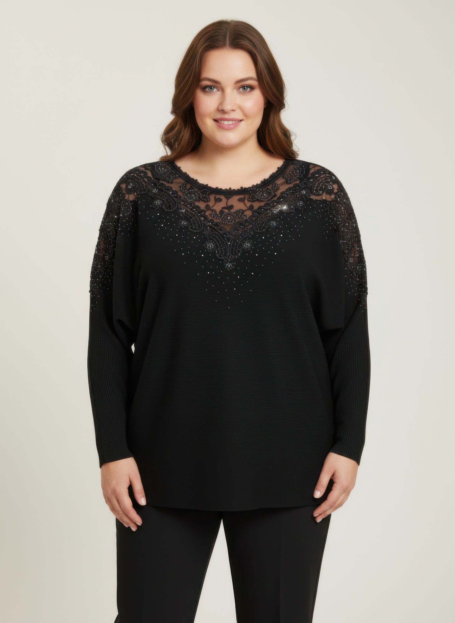 Black lace-embellished knit tunic top, crew neckline with ornate lace trim
