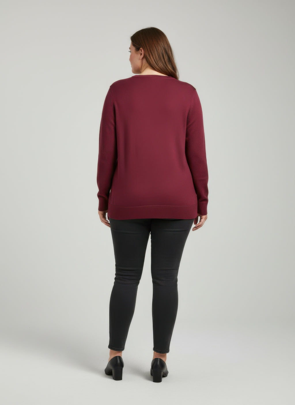 Burgundy knit tunic top, back view, long sleeves, crew neckline