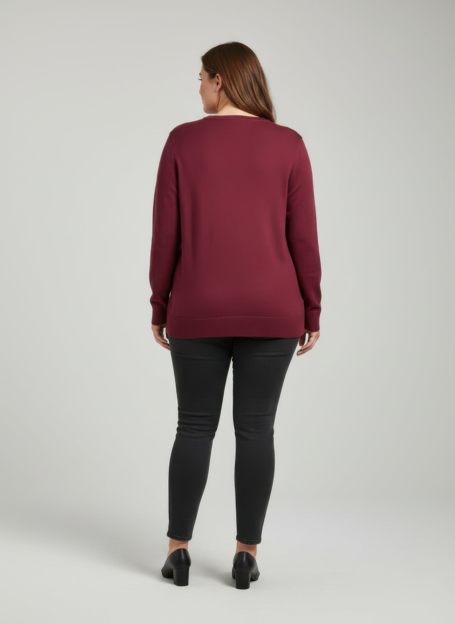 Burgundy knit tunic top, back view, long sleeves, crew neckline
