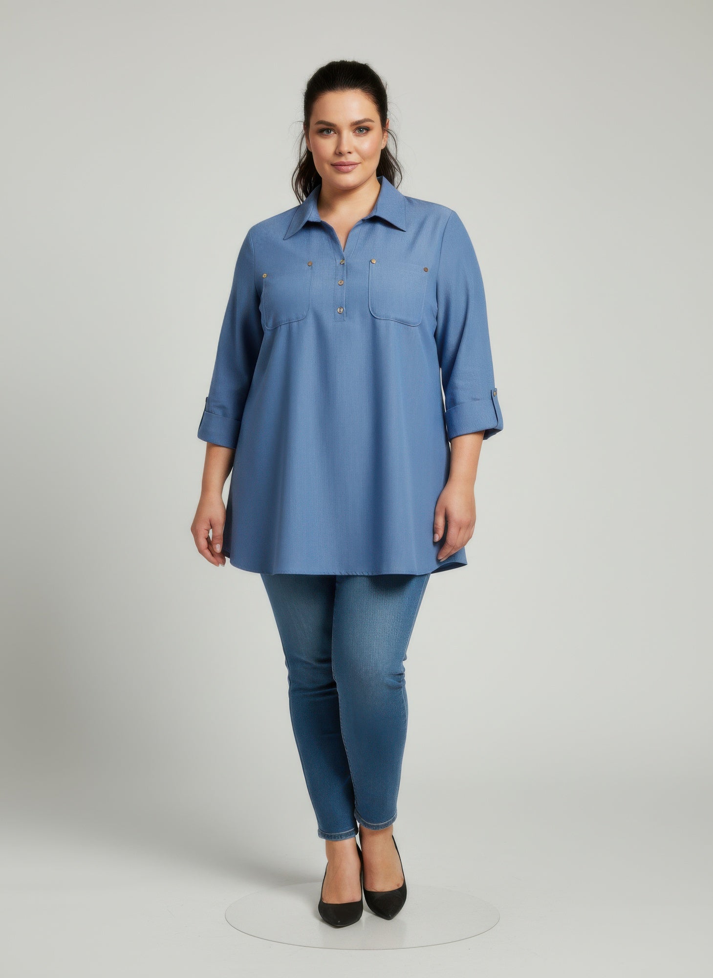 Utility button-front blouse in blue with roll sleeves and chest pockets
