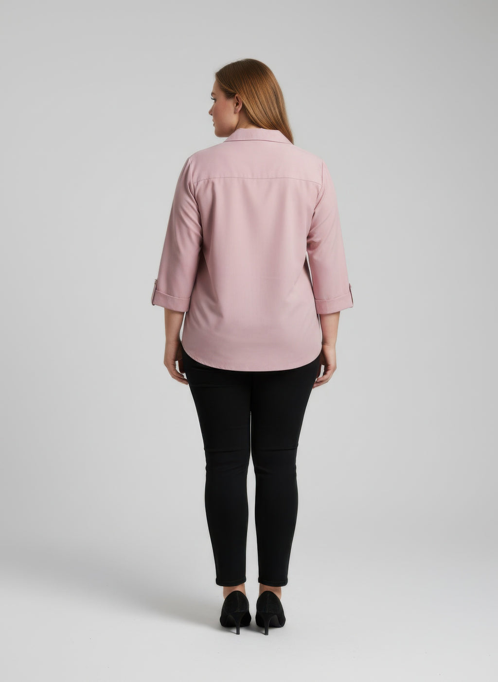 Blush pink button-front blouse with roll sleeves, back view