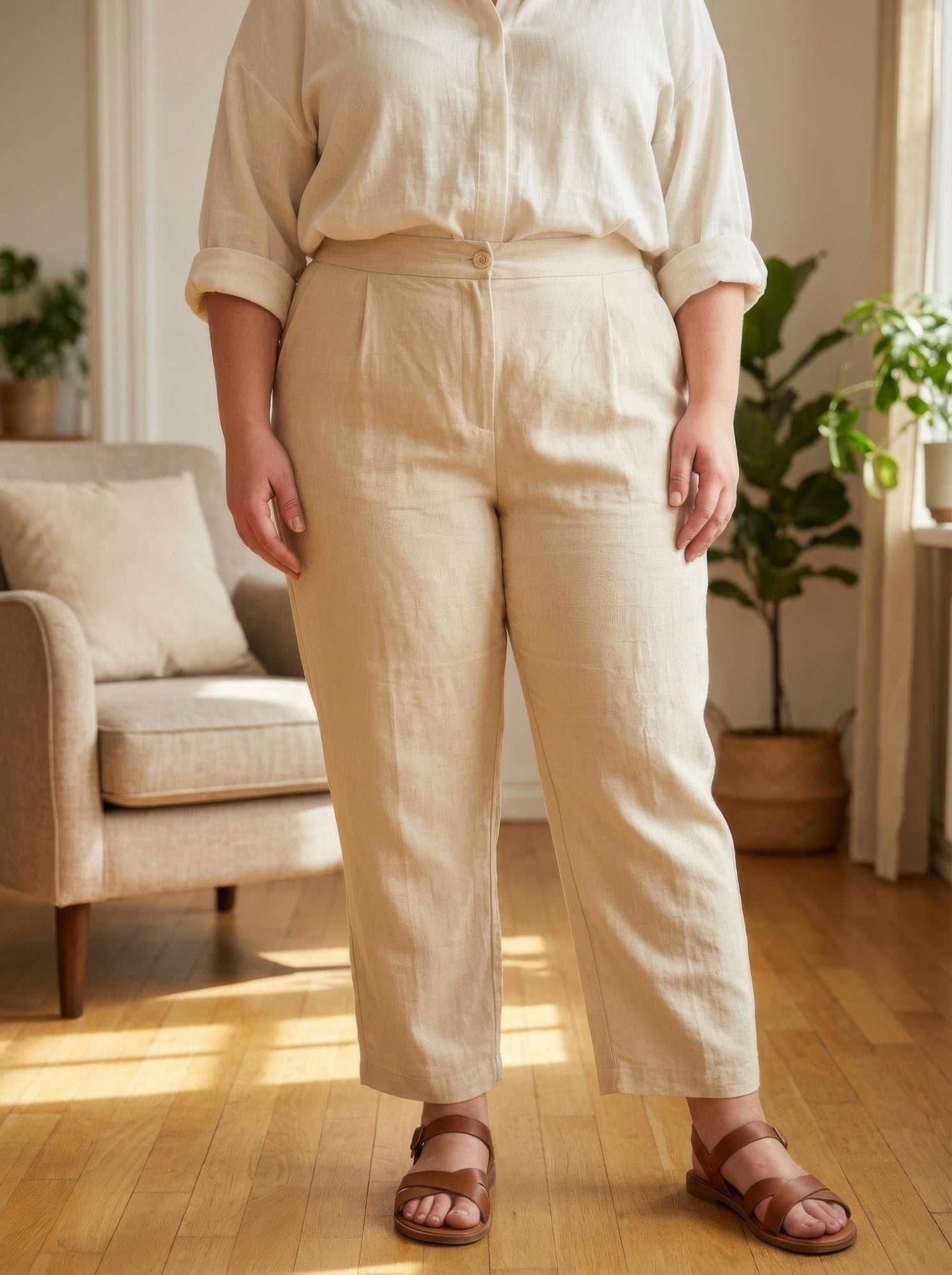 High-rise linen-blend straight-leg pants in apricot, wide waistband, ankle-cropped hem