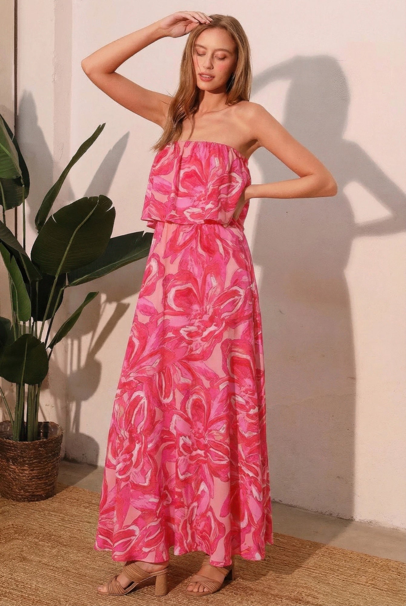 Chasing Petals strapless maxi dress in pink floral print with ruffled top and flowing skirt
