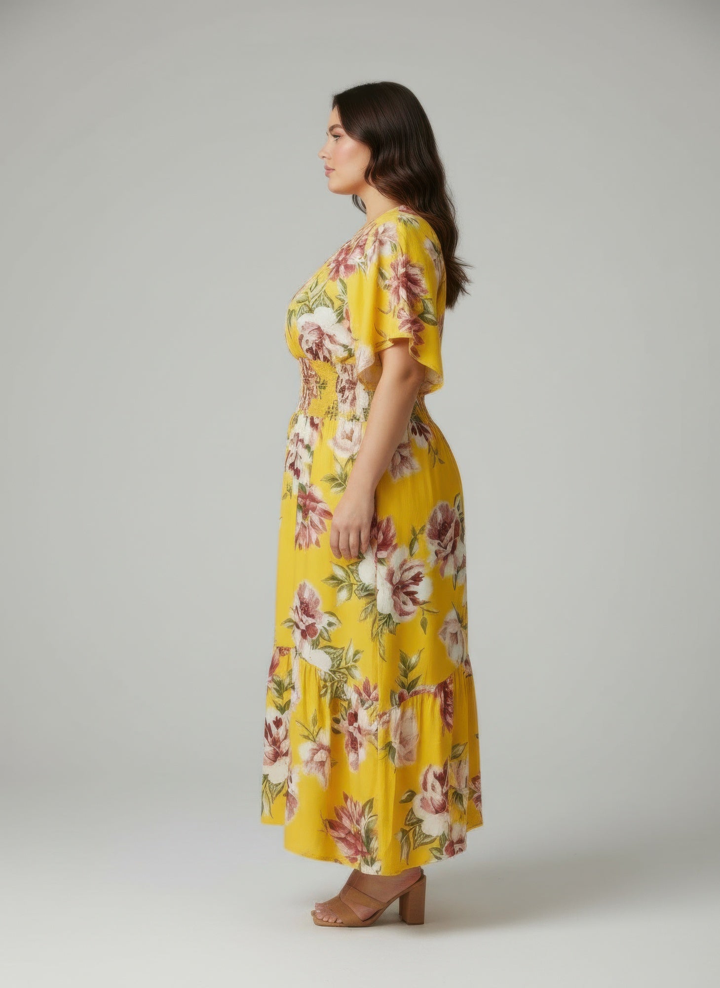 Floral dress in yellow with pink and green blooms, short sleeves, tiered skirt