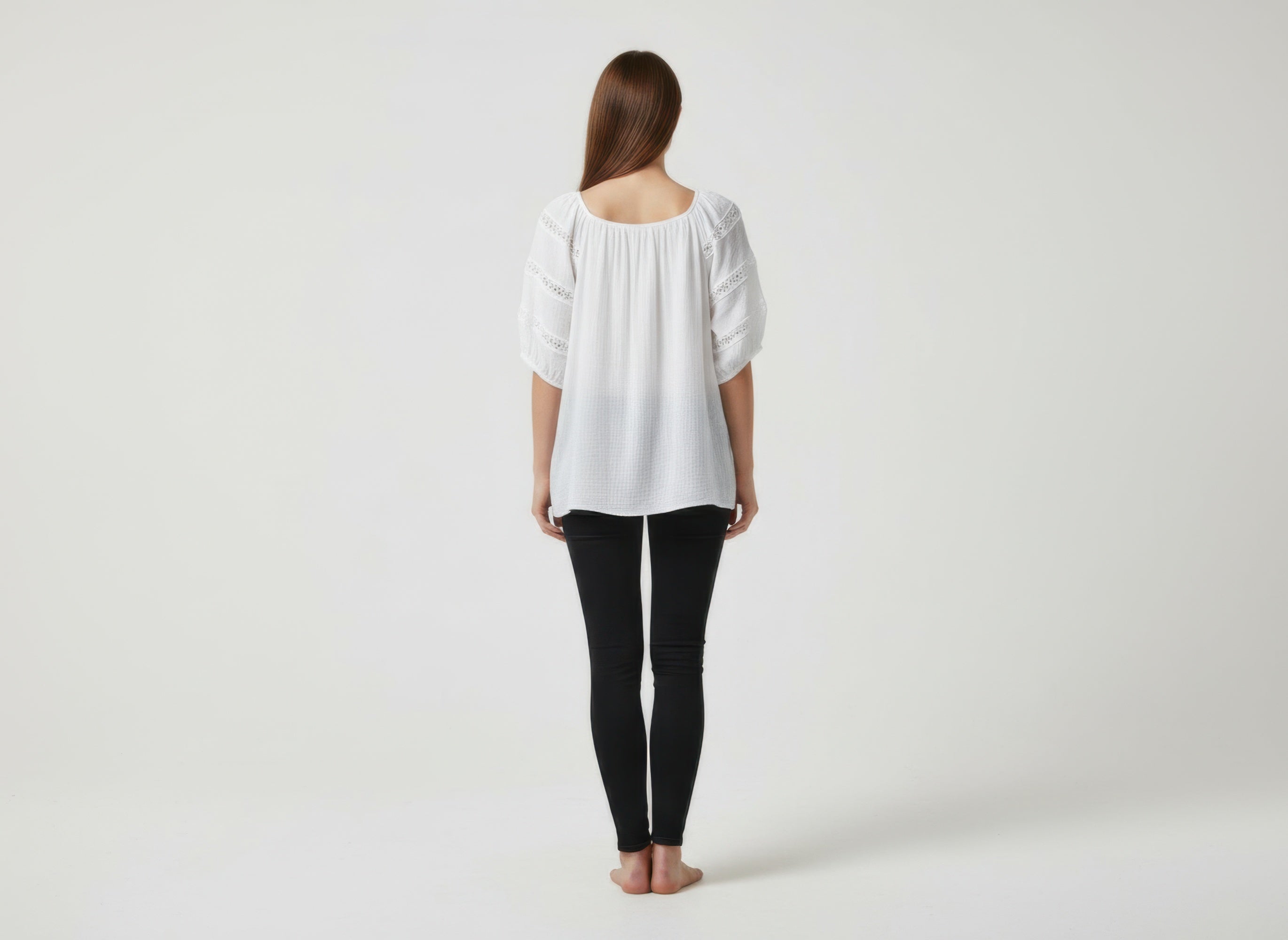 Unique Spectrum solid short sleeve blouse, white back view with embroidered yoke and sleeves