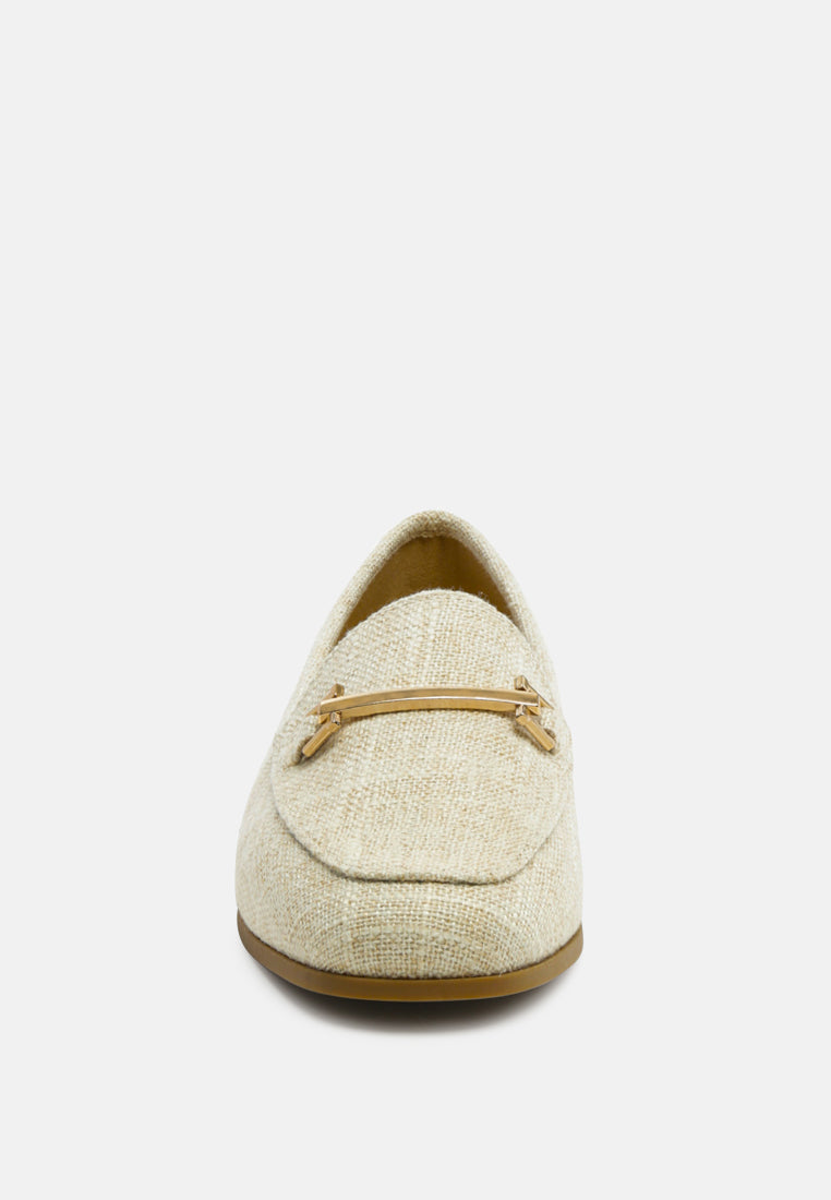 Beige loafer front view with gold horsebit bar detail and closed round toe
