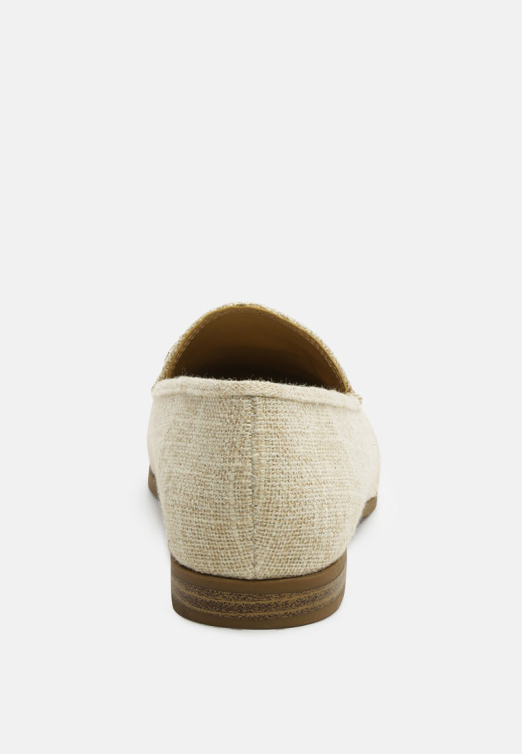 Zaara faux-suede loafers in Beige, back view with cushioned collar and block heel
