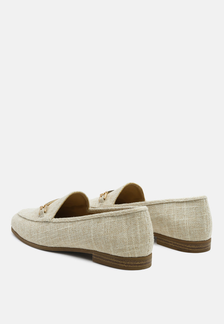 Beige loafer heel and side view with gold-toned horsebit detail