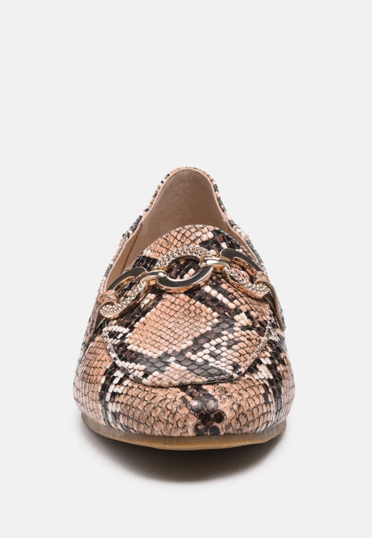 Natural snake-print loafer front with metal ring ornament detail
