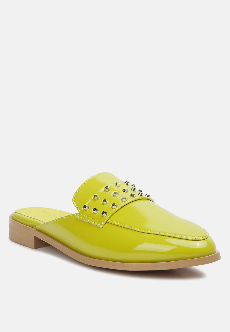Yashta patent studded flat mules (lime green) side view with shiny finish and studs.