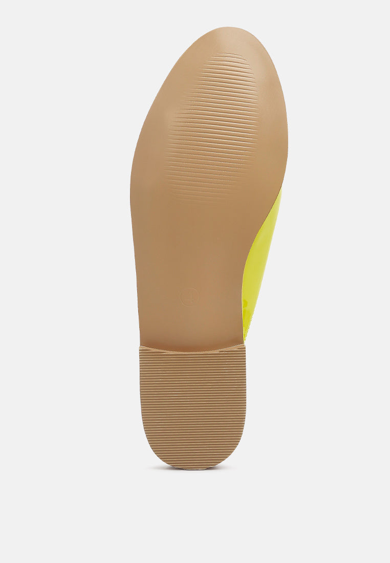 Lime green patent mule outsole and block heel bottom view