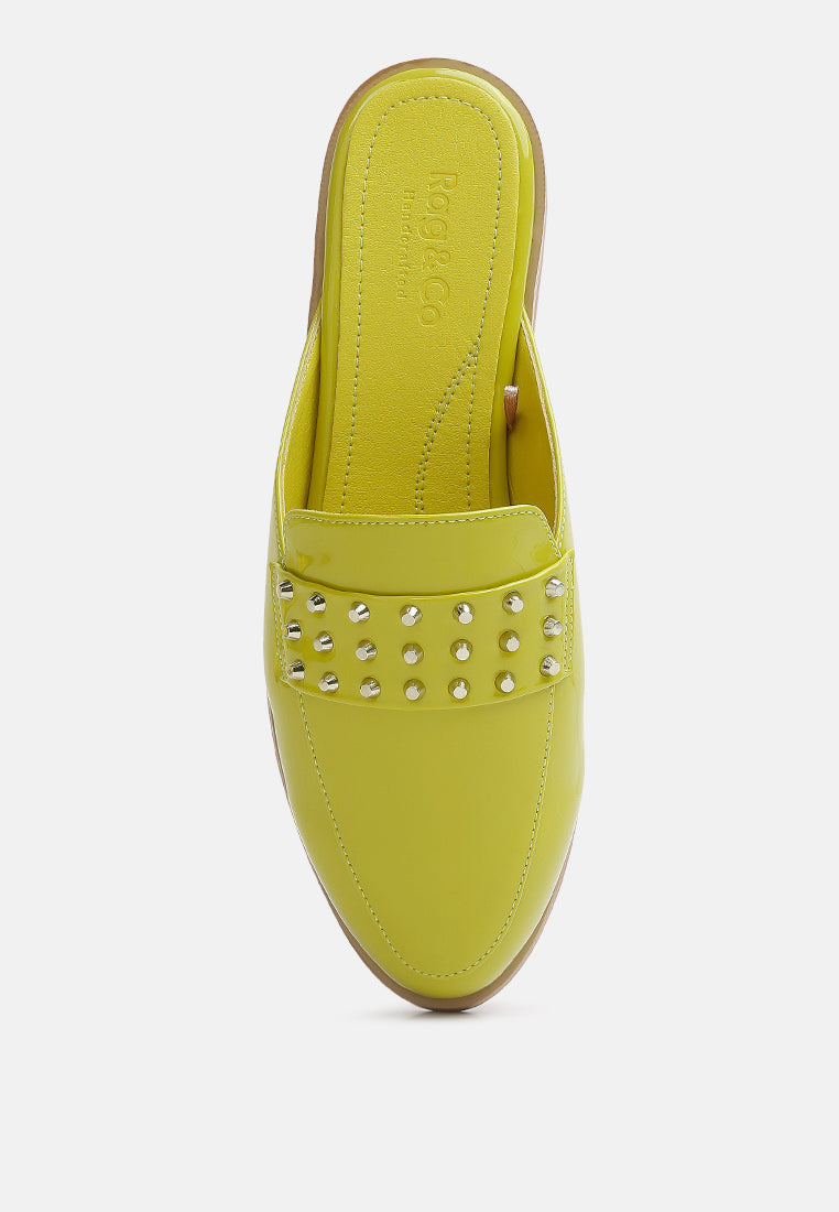 Lime green patent mule side view with stud row across the vamp