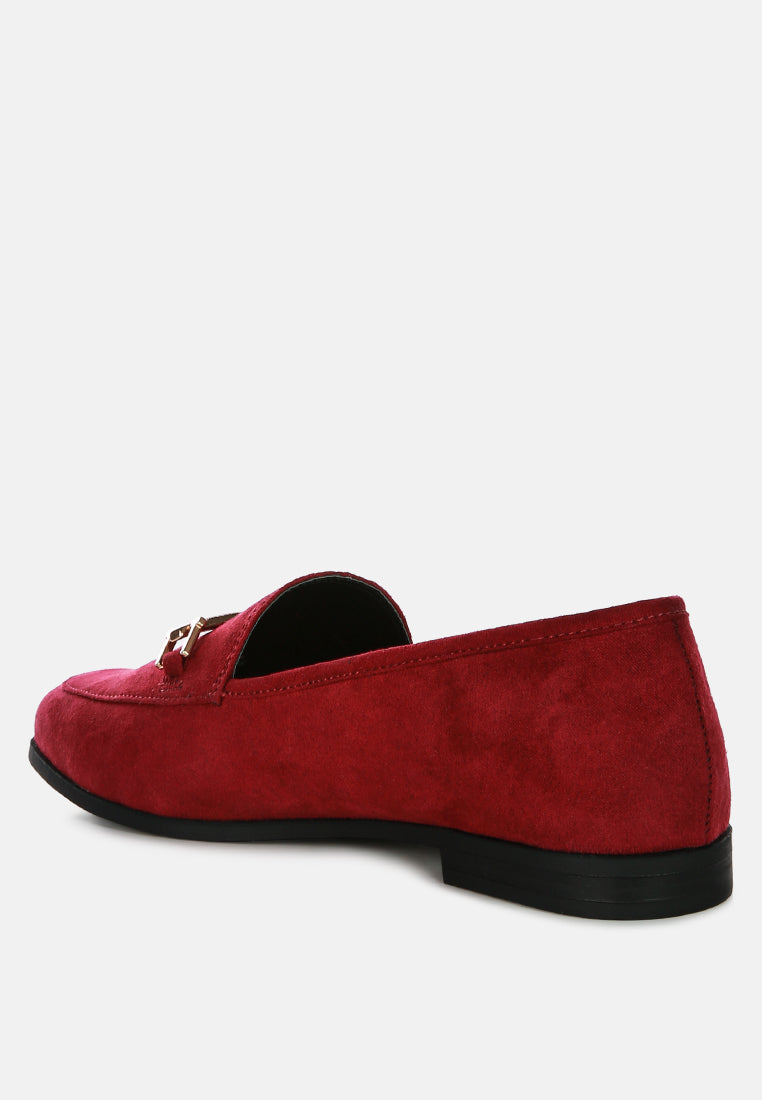 Zaara faux-suede loafers in Burgundy/Red, heel side view with metal bar accent