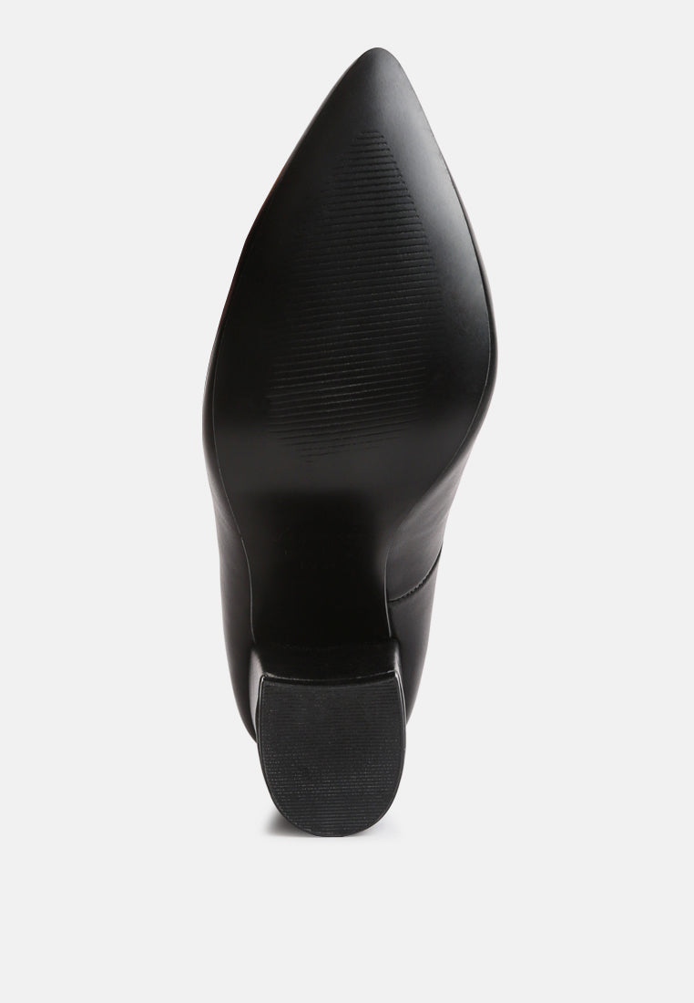 Black faux leather pump outsole and back heel, textured rubber grip