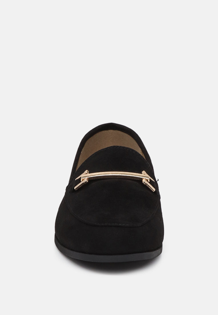 Black faux suede loafer front view with metal strap ornament and rounded toe