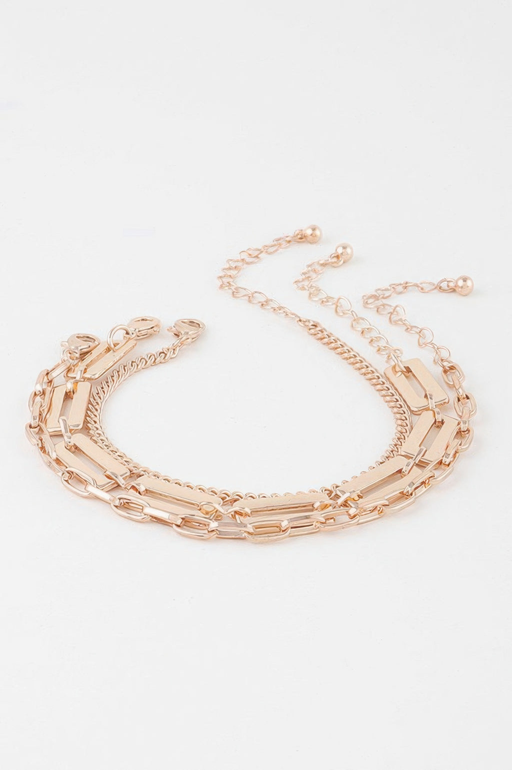 Triple plate curb link bracelet with lobster clasp, gold-tone curb chain layers