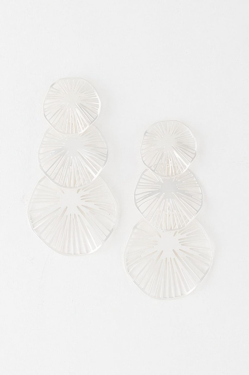 Triple Lemon Drop earrings—three layered silver fan discs