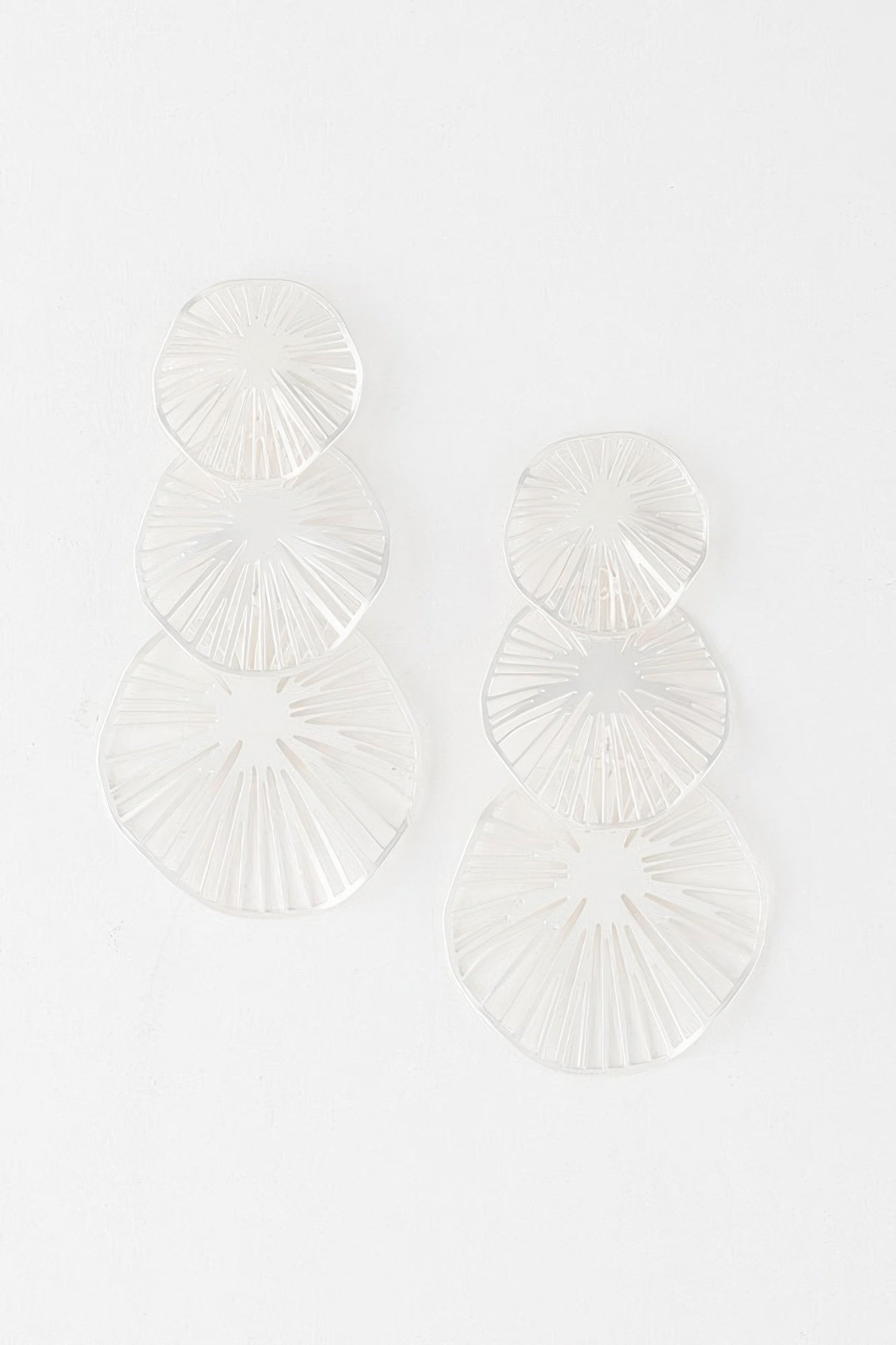 Triple Lemon Drop earrings—three layered silver fan discs