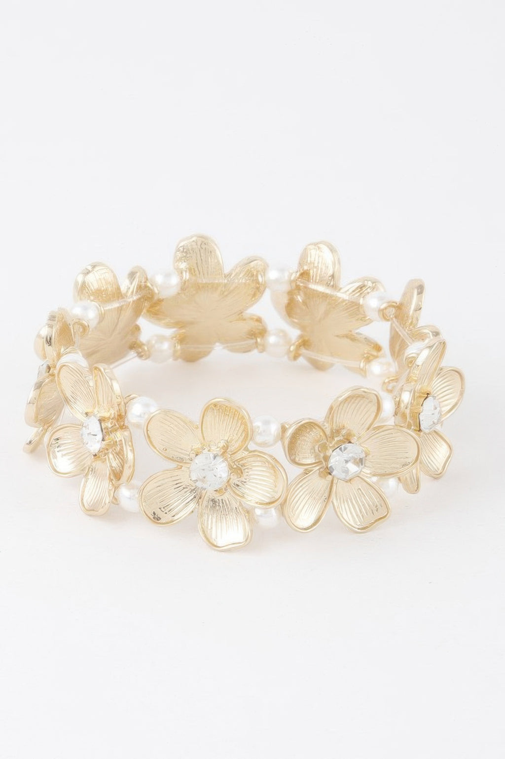 Jeweled flower bracelet, gold-cream, row of floral links with clear rhinestone dots