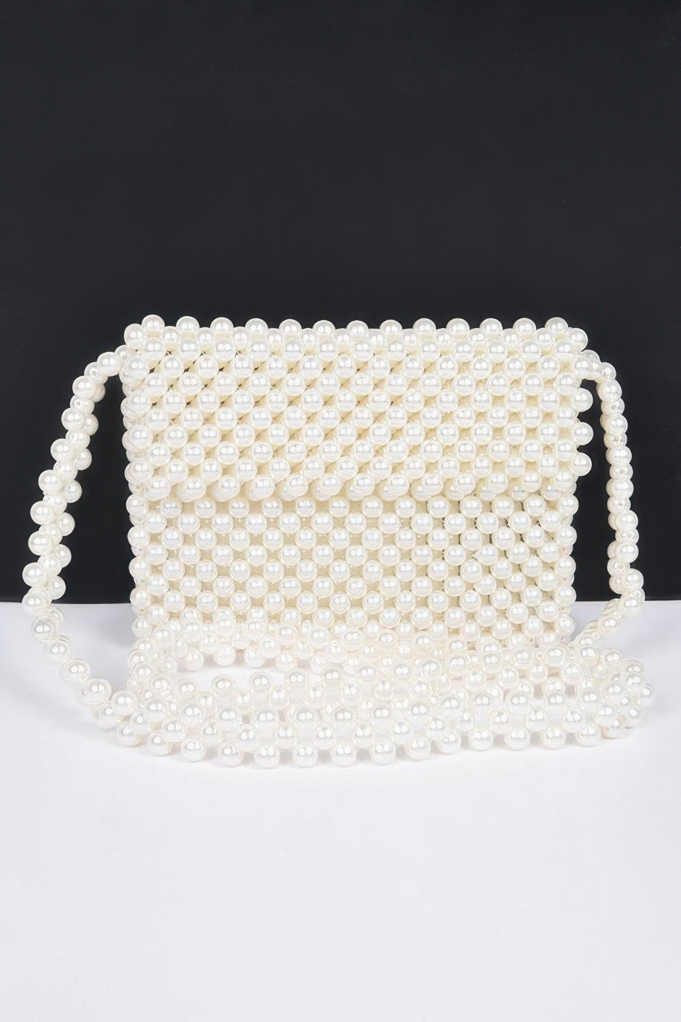 Cream faux pearl beaded flap crossbody bag with structured front