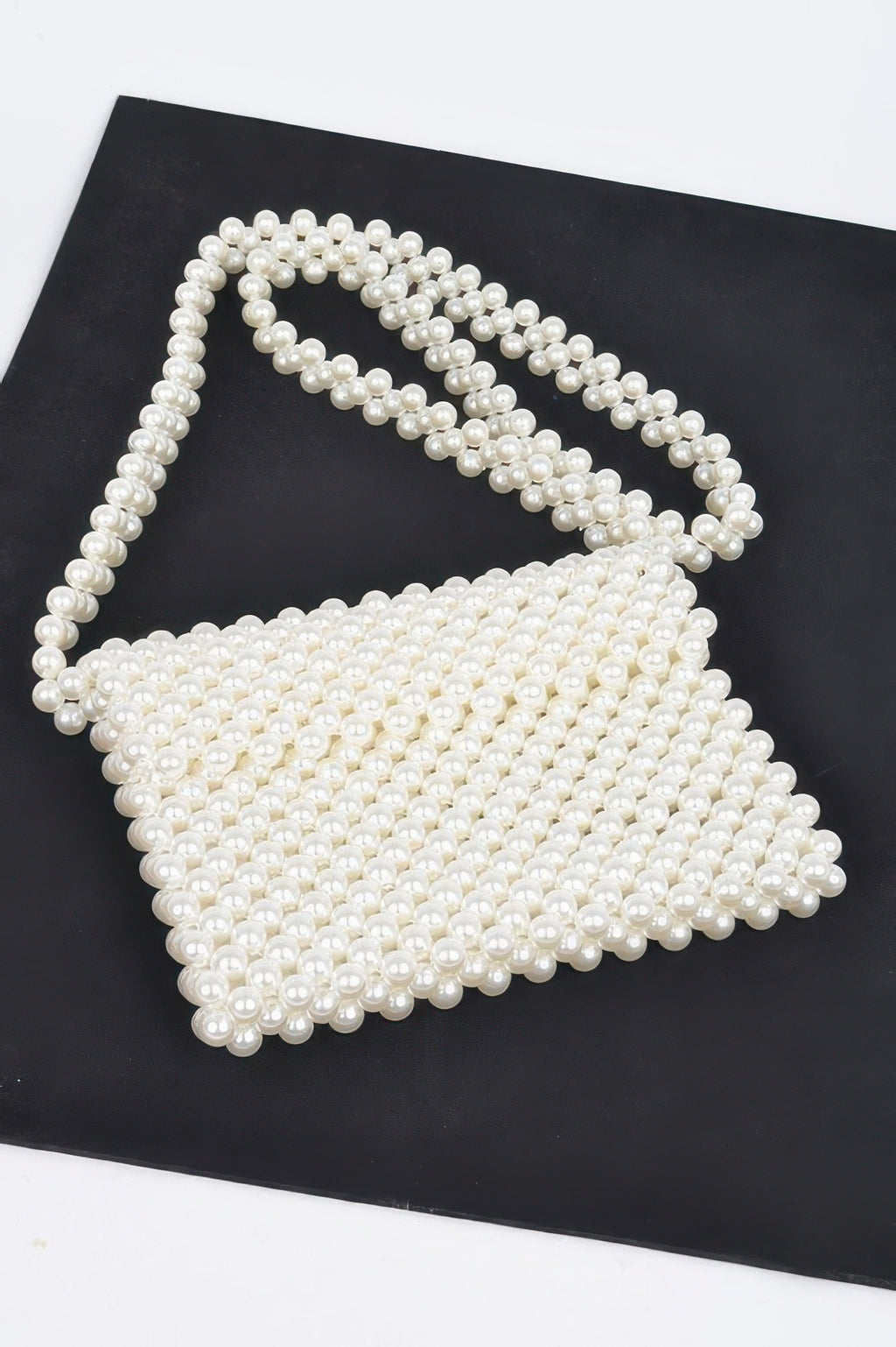 Cream faux pearl beaded flap crossbody bag, curved top and scalloped edge