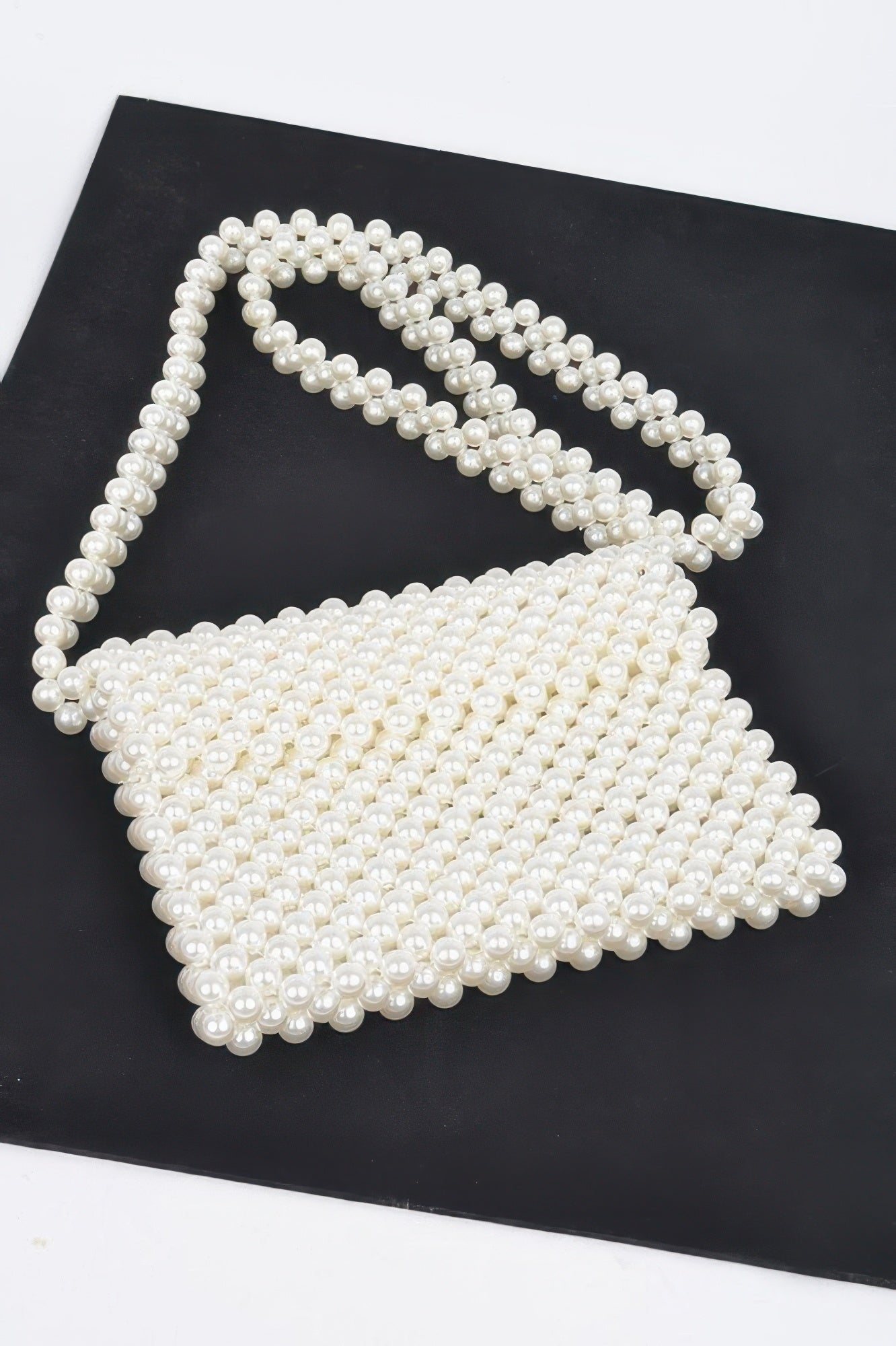 Cream faux pearl beaded flap crossbody bag, curved top and scalloped edge