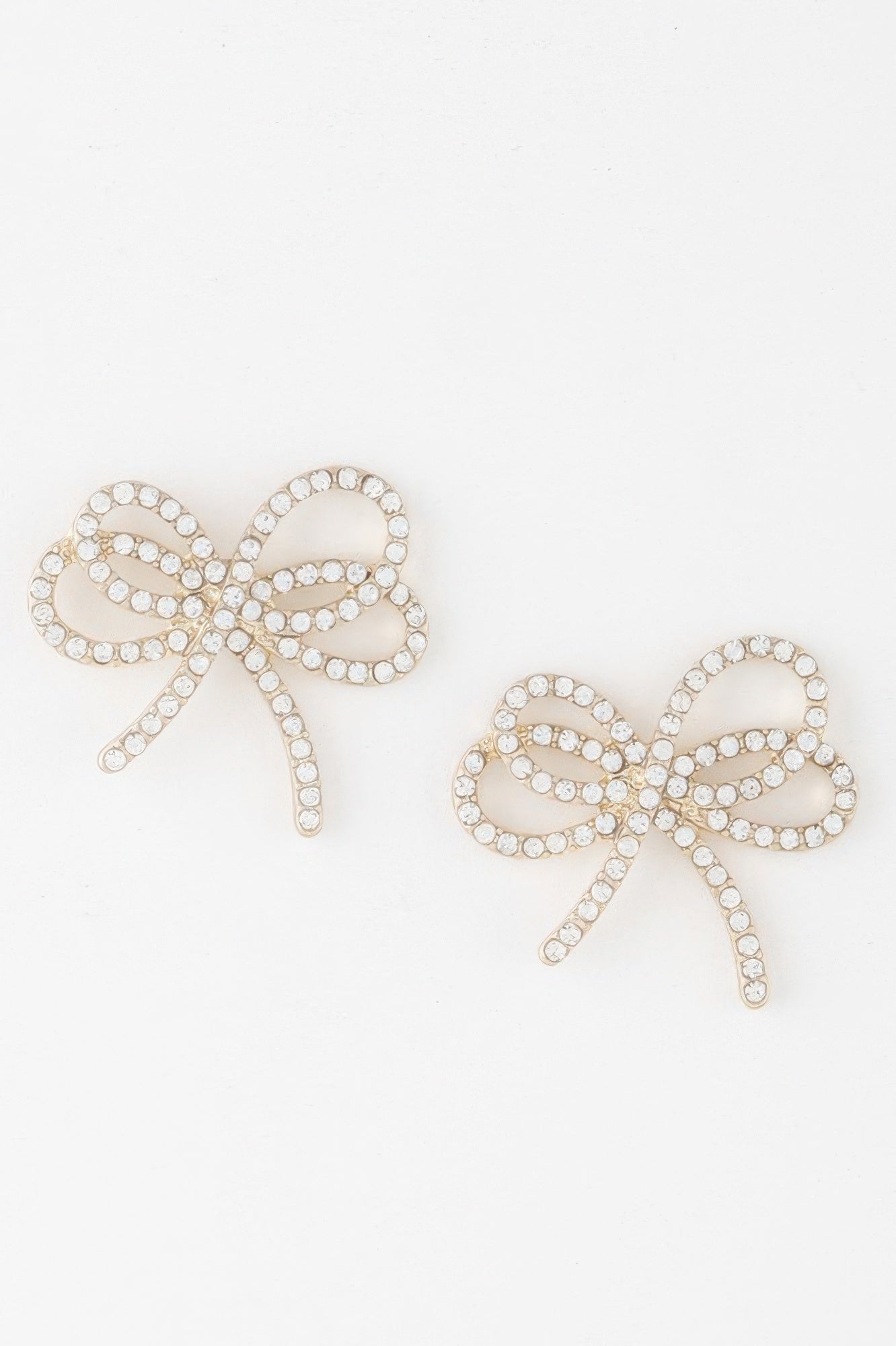 Double jeweled ribbon earrings with bow design, clear rhinestone accents, gold-tone finish