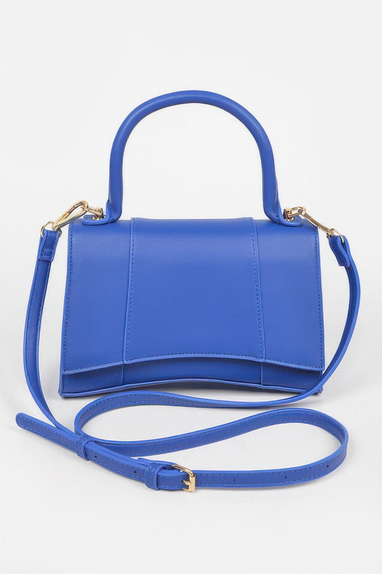 Cobalt blue faux leather top-handle bag with gold-tone hardware and shoulder strap
