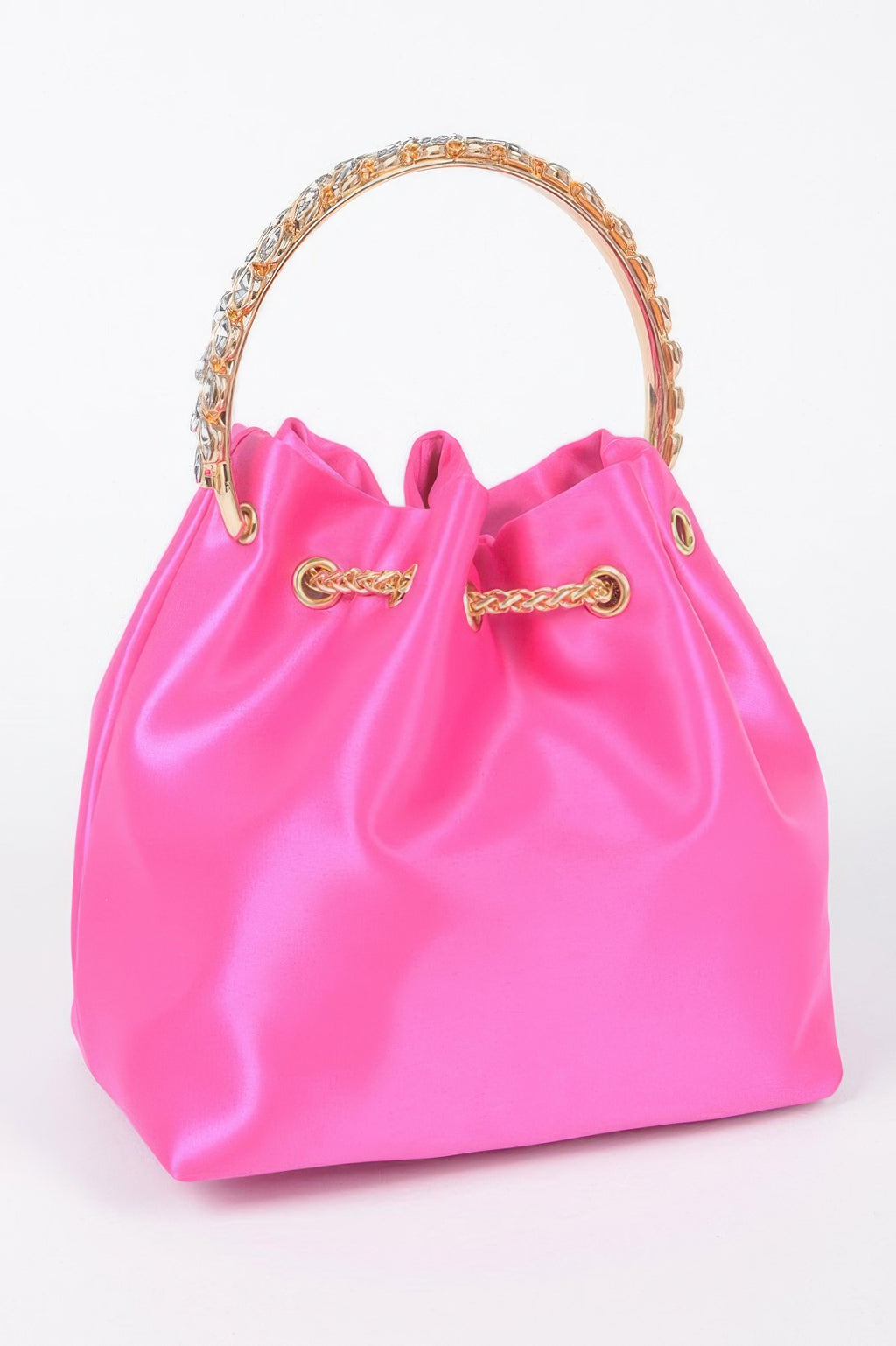 Fuchsia satin bucket bag with rhinestone handle ring and gold chain crossbody