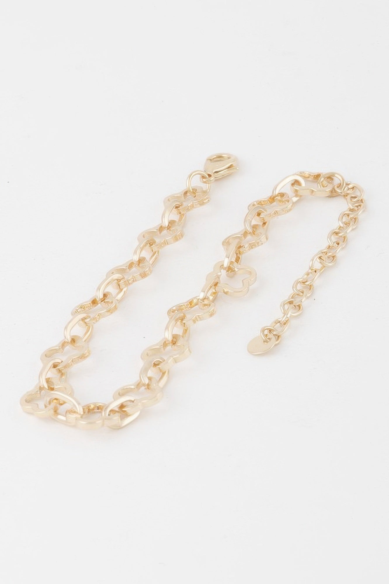 Clover link chain bracelet, gold-tone chain with clover charms and lobster clasp
