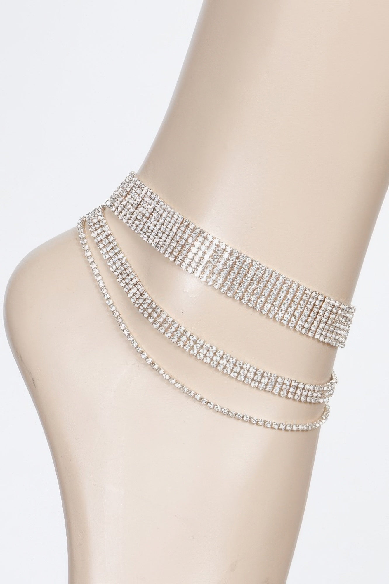 Layered rhinestone anklet with three-row sparkle chains, silver clear