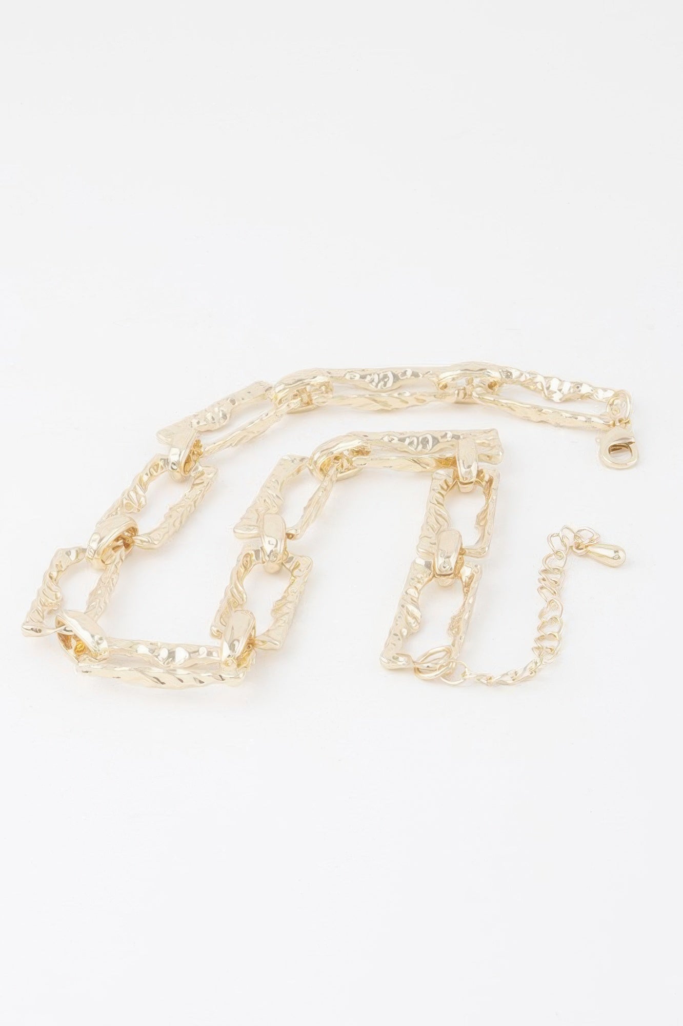 Hammered link chain necklace gold-tone, close-up of linked hammered rectangles