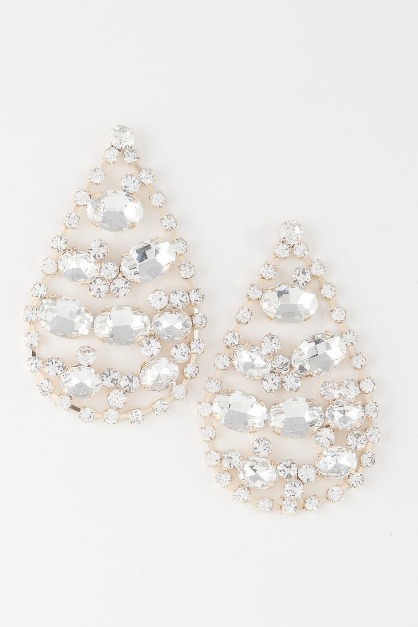 Rhinestone teardrop earrings with clear faceted stones, dangling cluster