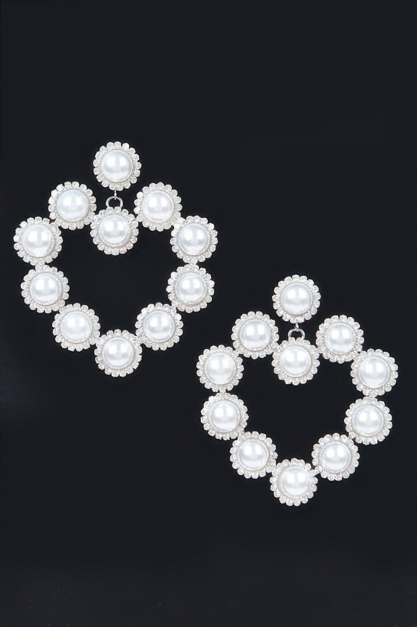Faux pearl hoop earrings with round faux pearl domes in silver-tone settings
