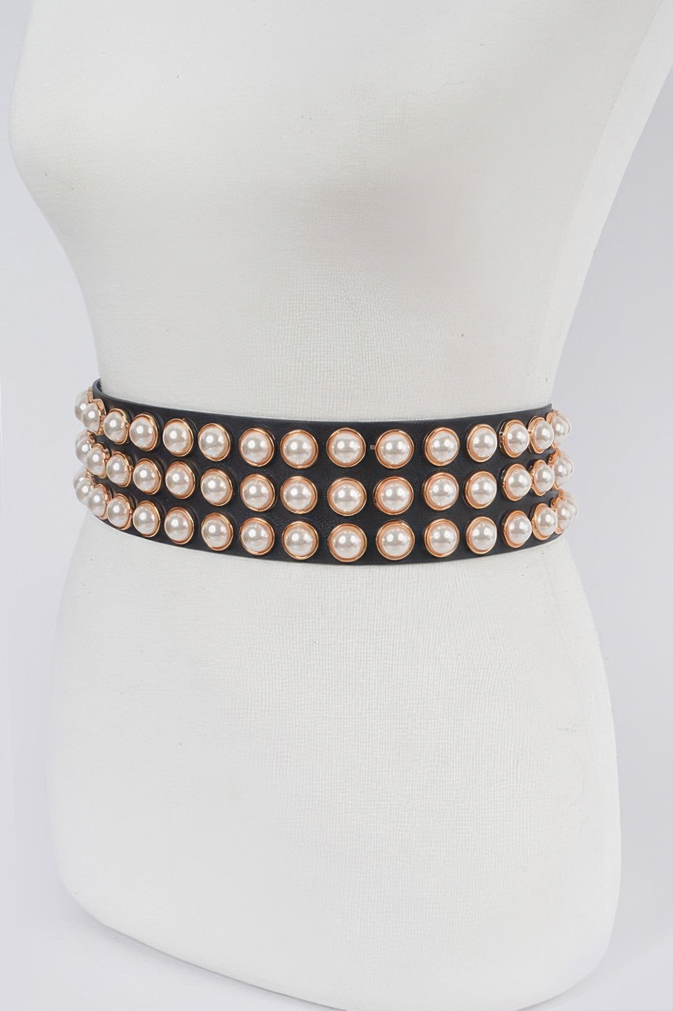Pearl studded waist belt featuring stacked rows on black band
