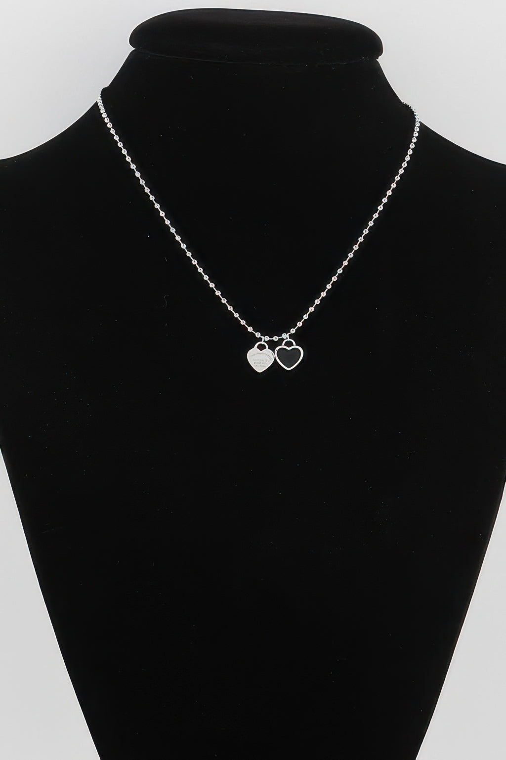 Elegant Heart Shap Pendant Necklace with silver chain and two white heart pendants